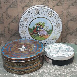 3 pc set of vintage round tins featuring elaborate ladies from the past.
